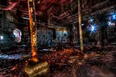 Abandoned factory interior art with pillars and fragments
