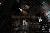 Dilapidated stairs in abandoned factory with light painting