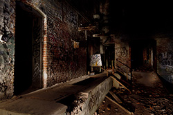abandoned factory basement in light painting photo