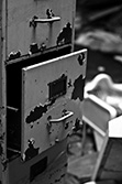 open drawer with rust in black and white picture