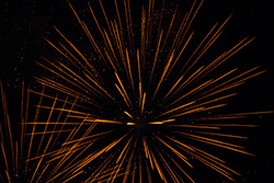orange firework explosion with sparkles