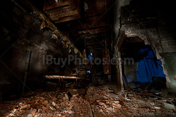 Abandoned basement light painting photo with broken wall and fragments