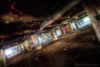 Abandoned parking lot HDR with graffiti and pillars