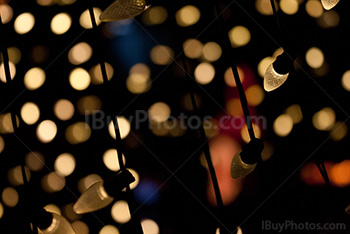 White fairy lights with blue and red glimmer lights on background