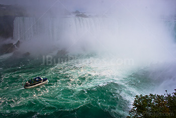 Niagara falls boat ride on river and mist