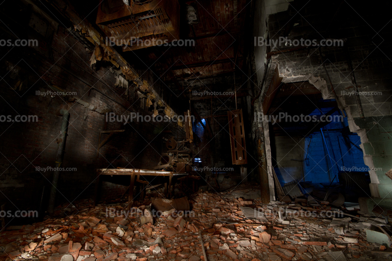 Abandoned basement light painting photo with broken wall and fragments