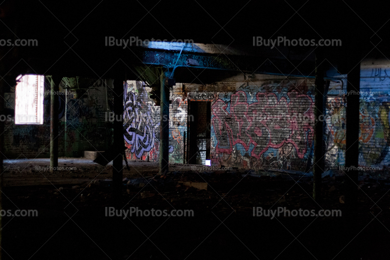 Abandoned factory interior with bricks wall