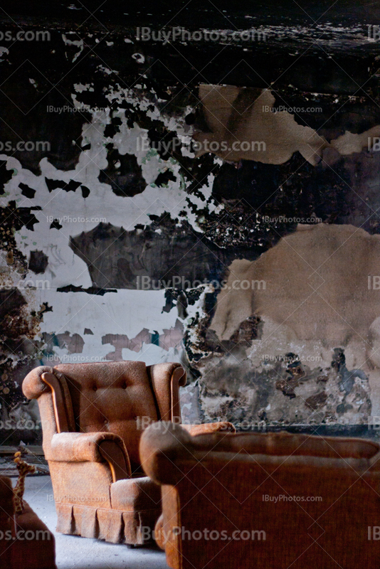 Old armchair in abandoned place