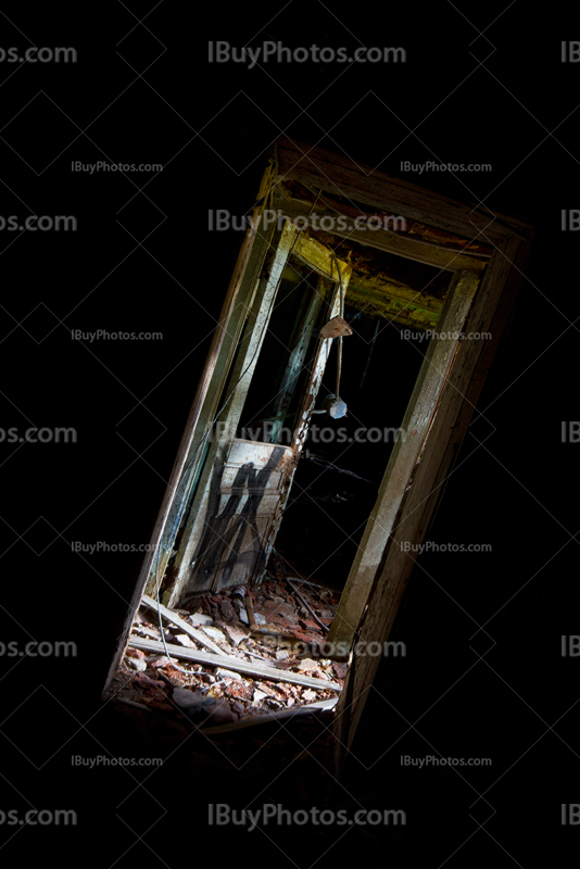 Doorway light in dark abandoned room