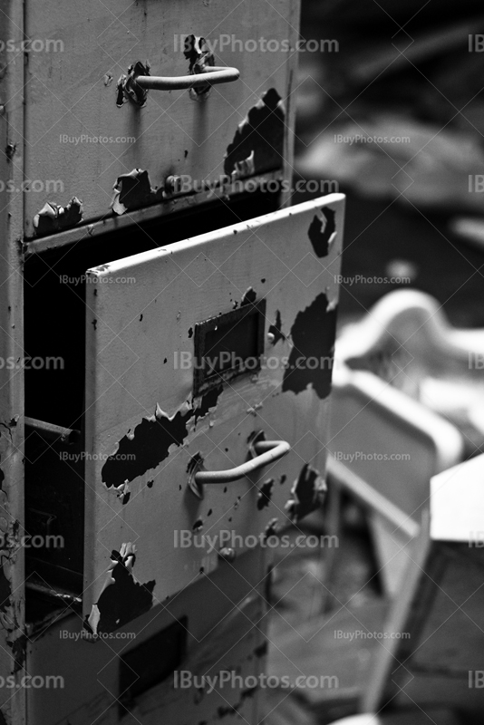 Open drawer with rust in black and white picture