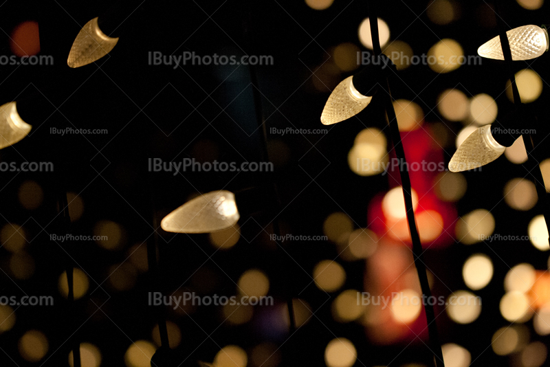 Fairy lights and strings with glimmer lights on background