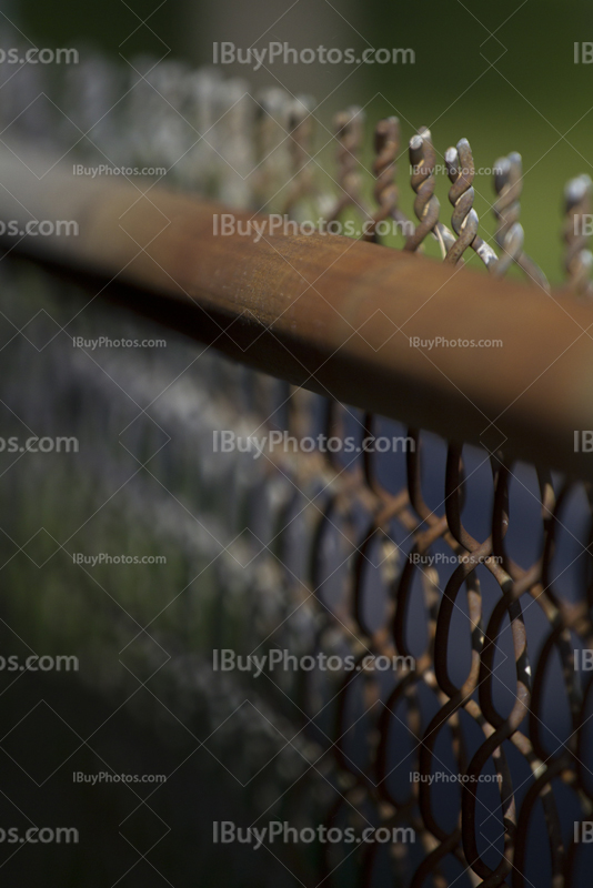 Rusty chain link fence top with vanishing point