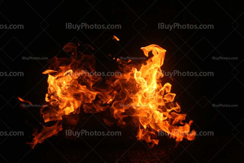 Yellow and red flames on dark background