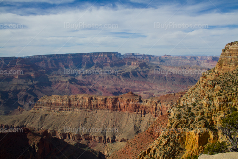 Grand Canyon cliffs under cloudy sky