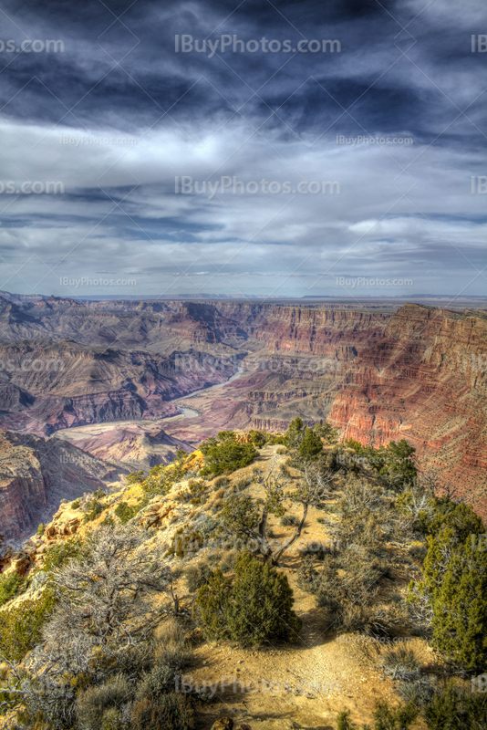 Grand Canyon HDR photo with Colorado river and cloudy sky