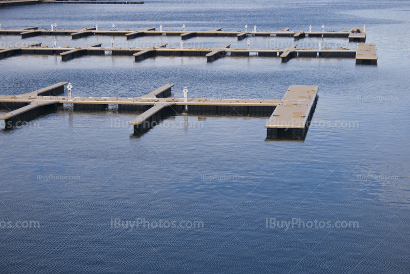 Wooden jetty in harbor, port and water