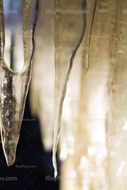 Stalactites with ice in the sunlight