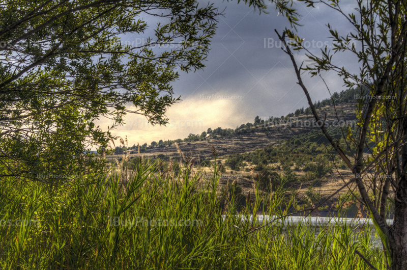 Salagou lake HDR with reeds and hill