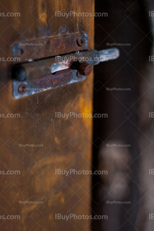 Rusty lock on door, larch plate, targette