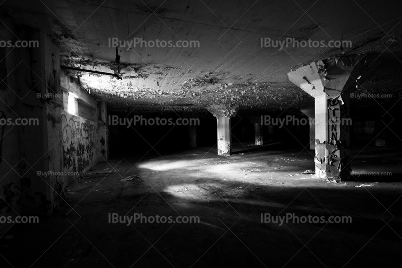Underground parking lot with light coming from window