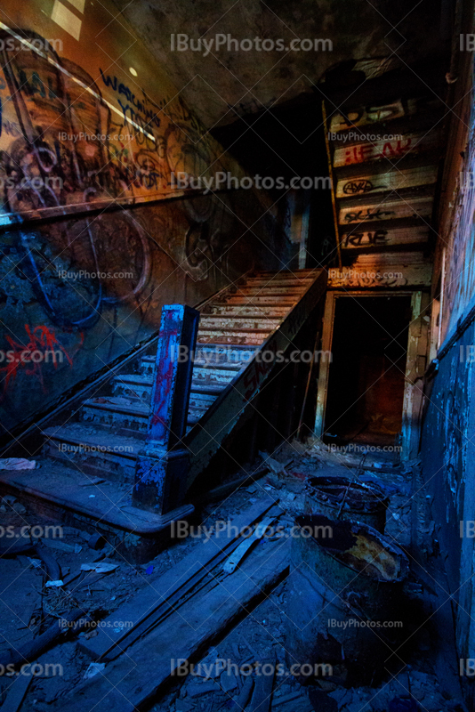 Abandoned stairs perspective with doorway and crumbling walls