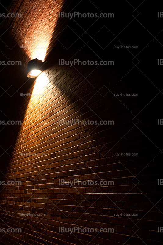 Street light on brick wall