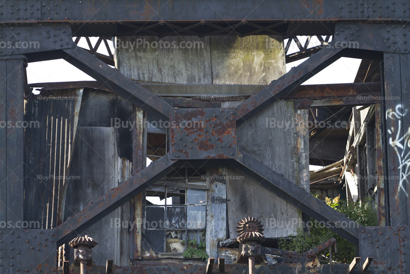 Metal structure with crossed beams steel and broken windows