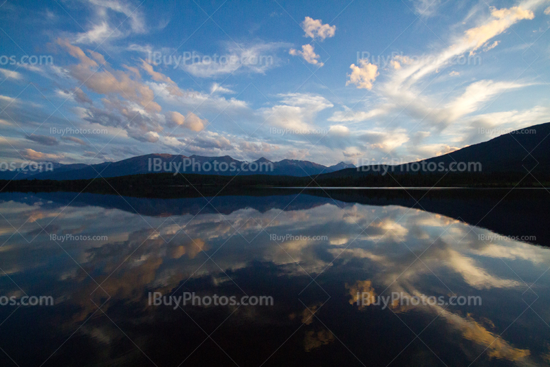 Sunset reflection on water, Pyramid Lake, Jasper, Alberta