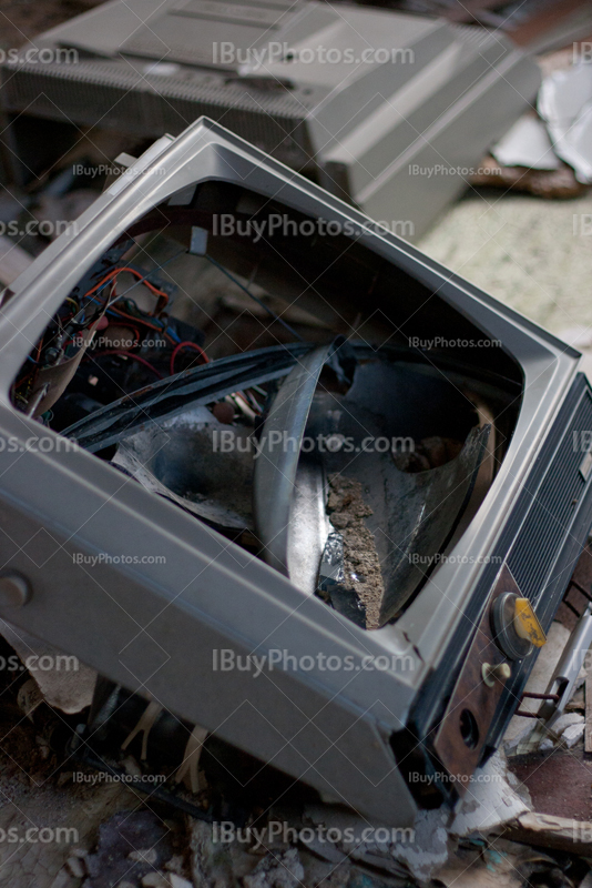 Broken television screen on floor