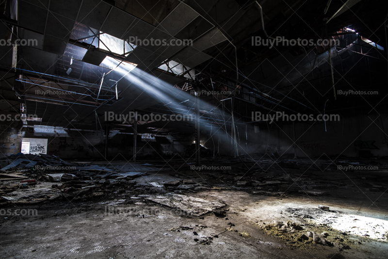 Sunlight from ceiling in abandoned building