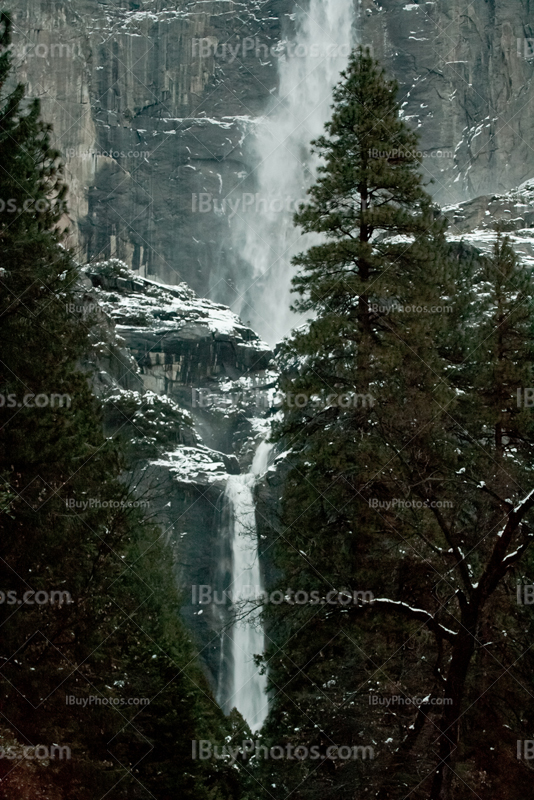 Yosemite waterfalls with upper, middle and lower falls, cascades between trees