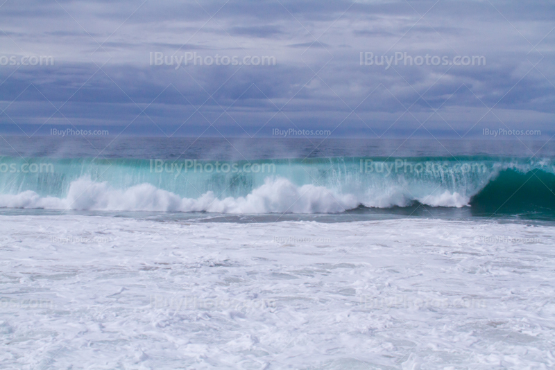 Pacific waves in California, ocean and cloudy sky