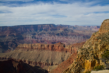 Grand Canyon cliffs under cloudy sky