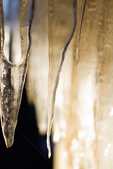 Stalactites with ice in the sunlight