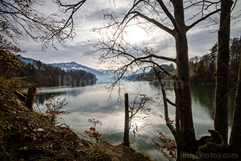 Gruyere lake reflection with clouds