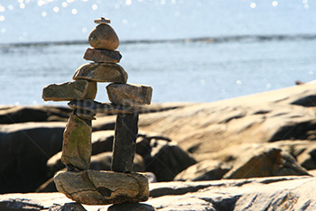 Inukshuk with stacked rocks in Canada