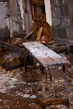 Old wooden bench with rusty elements