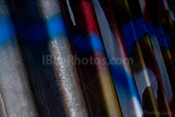 Corrugated iron with graffiti and shades