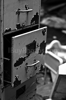 Open drawer with rust in black and white picture