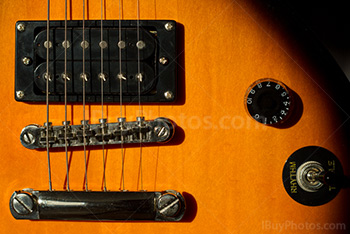 Electric guitar close up with bridge pickup