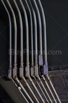 Plastic pipes on concrete beam