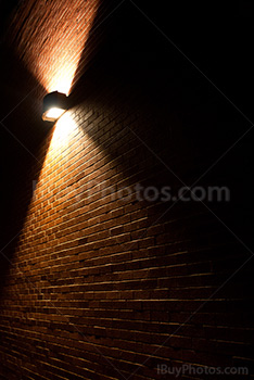 Street light on brick wall