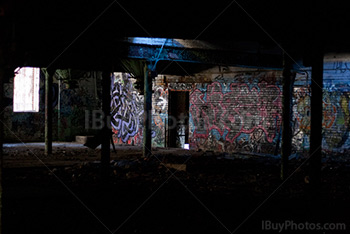 Abandoned factory interior with bricks wall