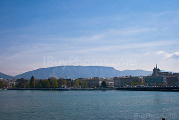 Geneva port and Leman Lake with Swiss mountains on background