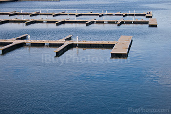 Wooden jetty in harbor, port and water