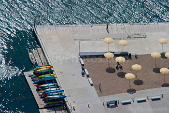 Aerial view of harbor with umbrellas and kayaks, Toronto, Canada