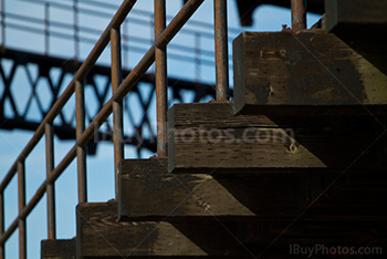 Bridge structure with wooden beams and metal banister